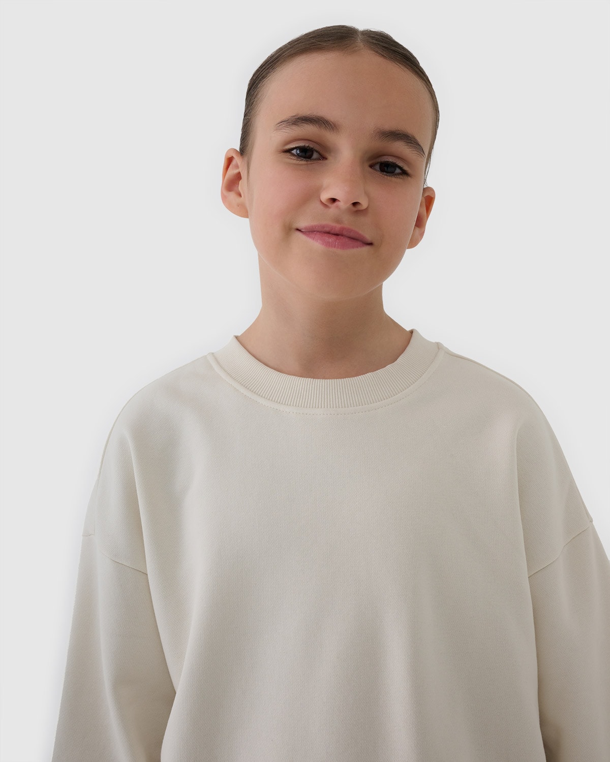 4F Bluza dresowa nierozpinana bez kaptura dziewczęca - beżowa 122 (6-7 lat)