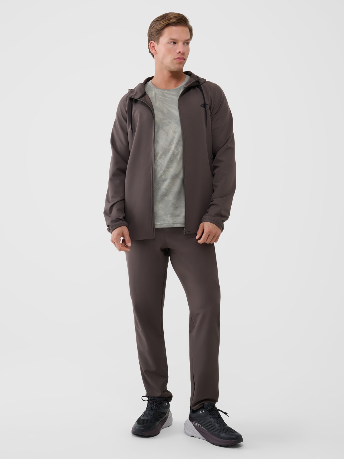 4F Spodnie treningowe szybkoschnące męskie - brązowe L