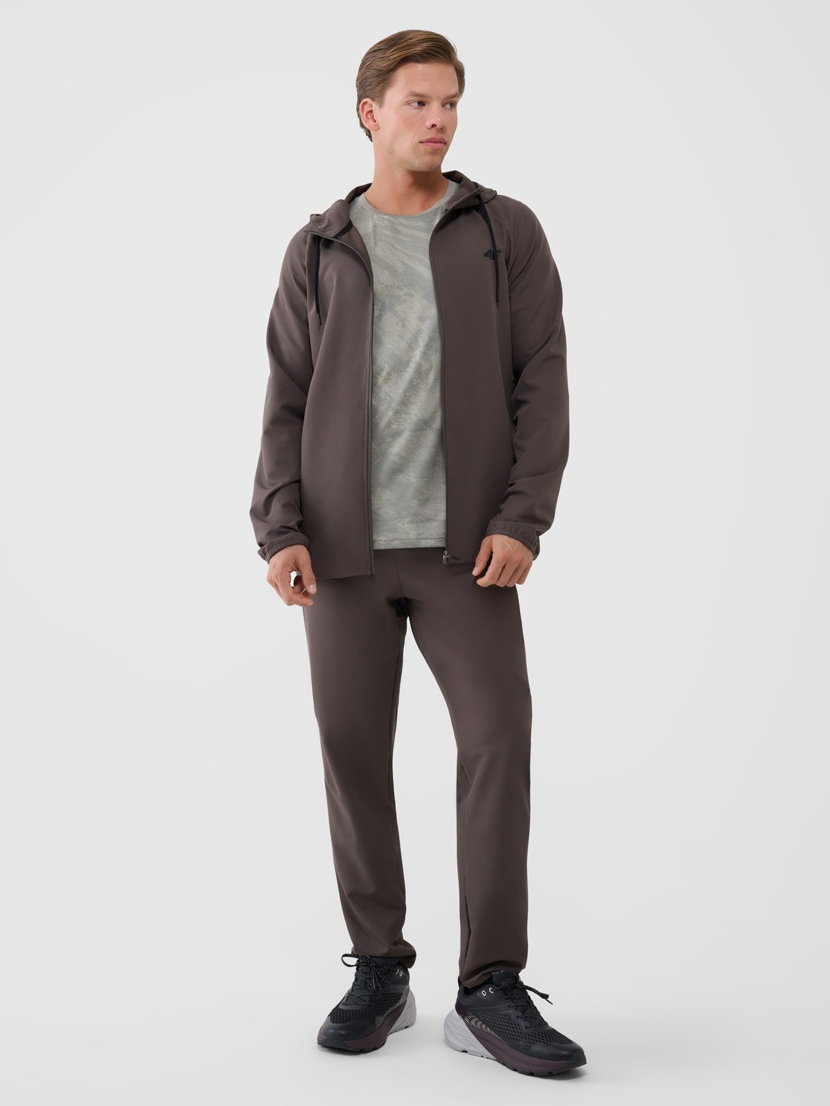 4F Spodnie treningowe szybkoschnące męskie - brązowe L