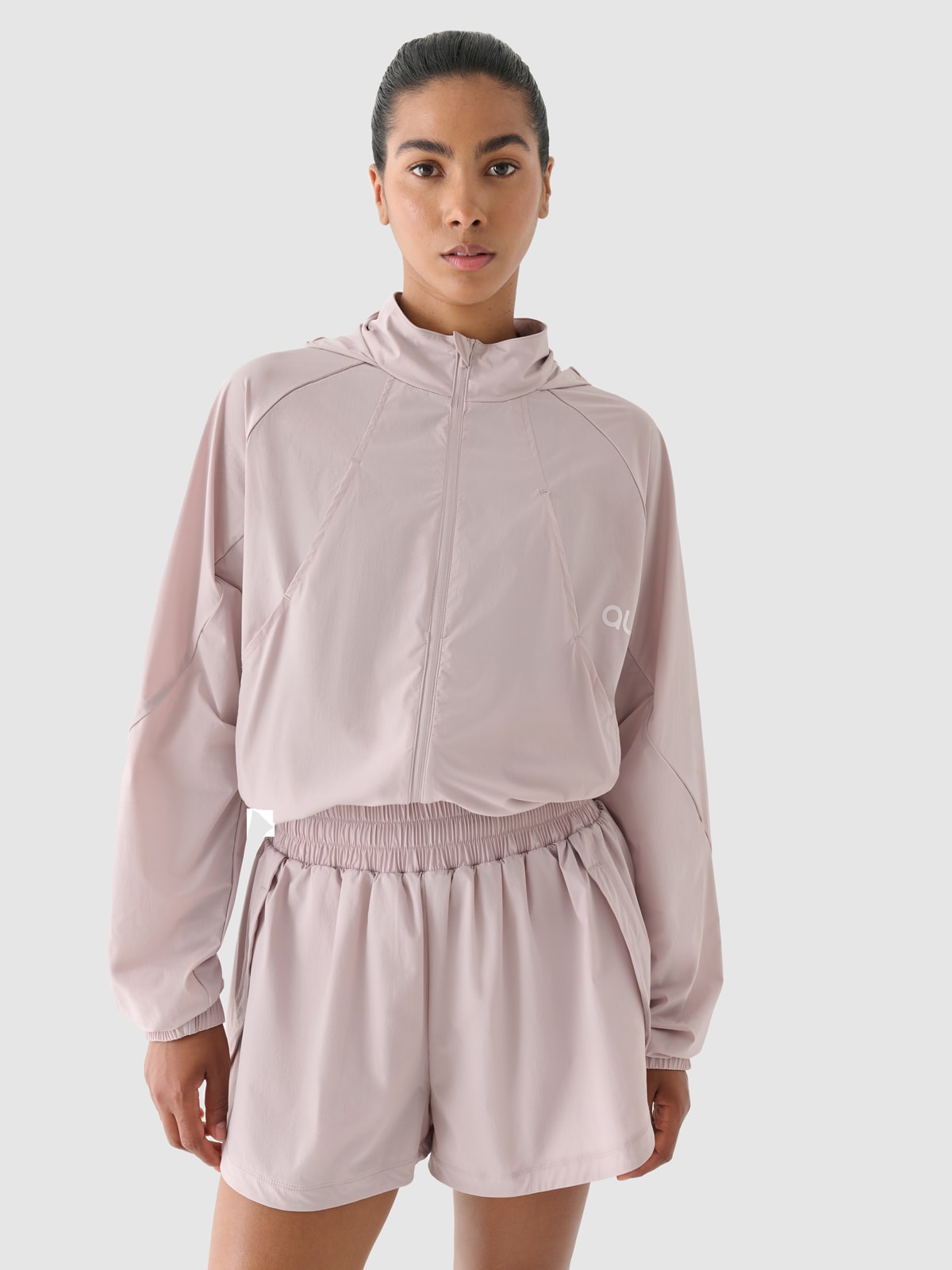 Жіноча куртка для тренувань 4F x Anna Lewandowska - бежевий