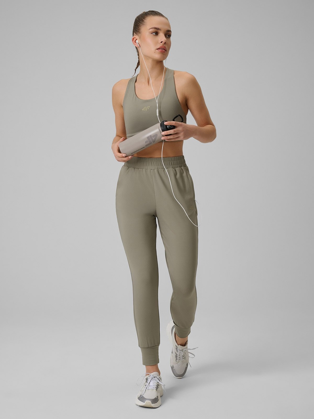 Жіночі швидковисихаючі тренувальні штани - оливкові