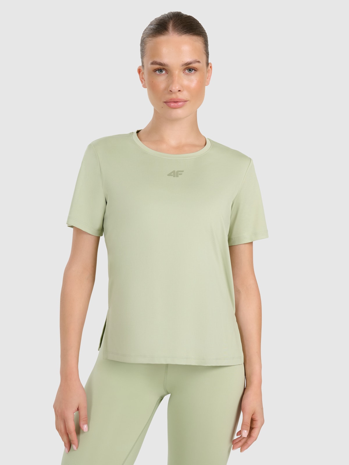 Жіноча регулярна швидковисихаюча тренувальна футболка - зелена