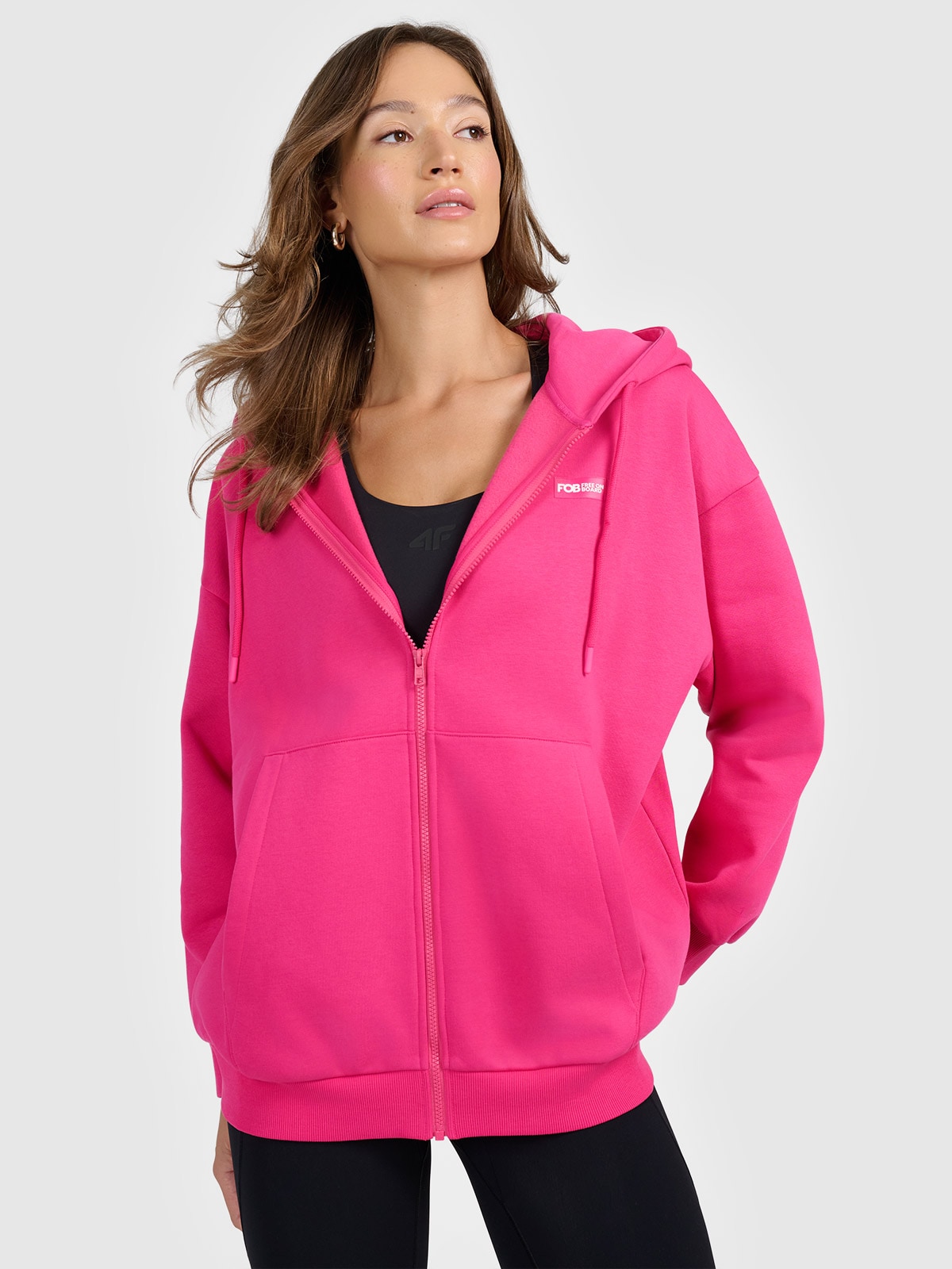 Жіноча спортивна кофта на блискавці з капюшоном - рожева