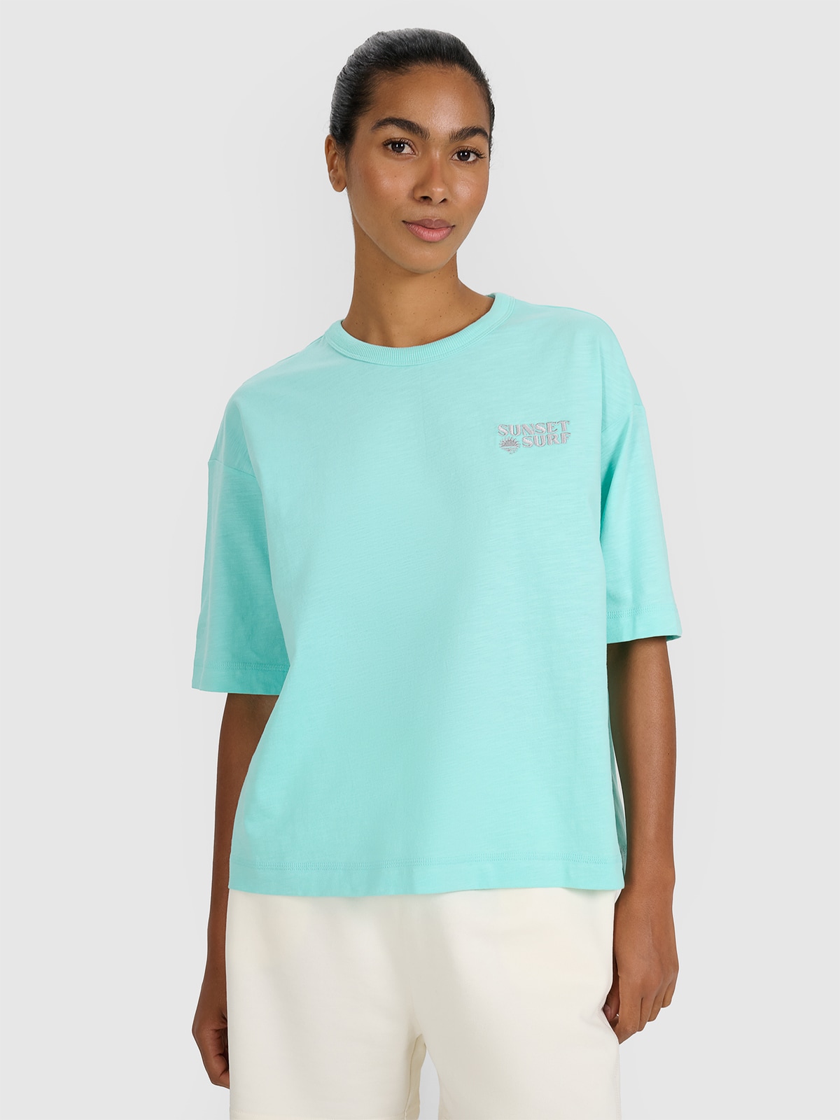 Жіноча oversize футболка з принтом - бірюзовий