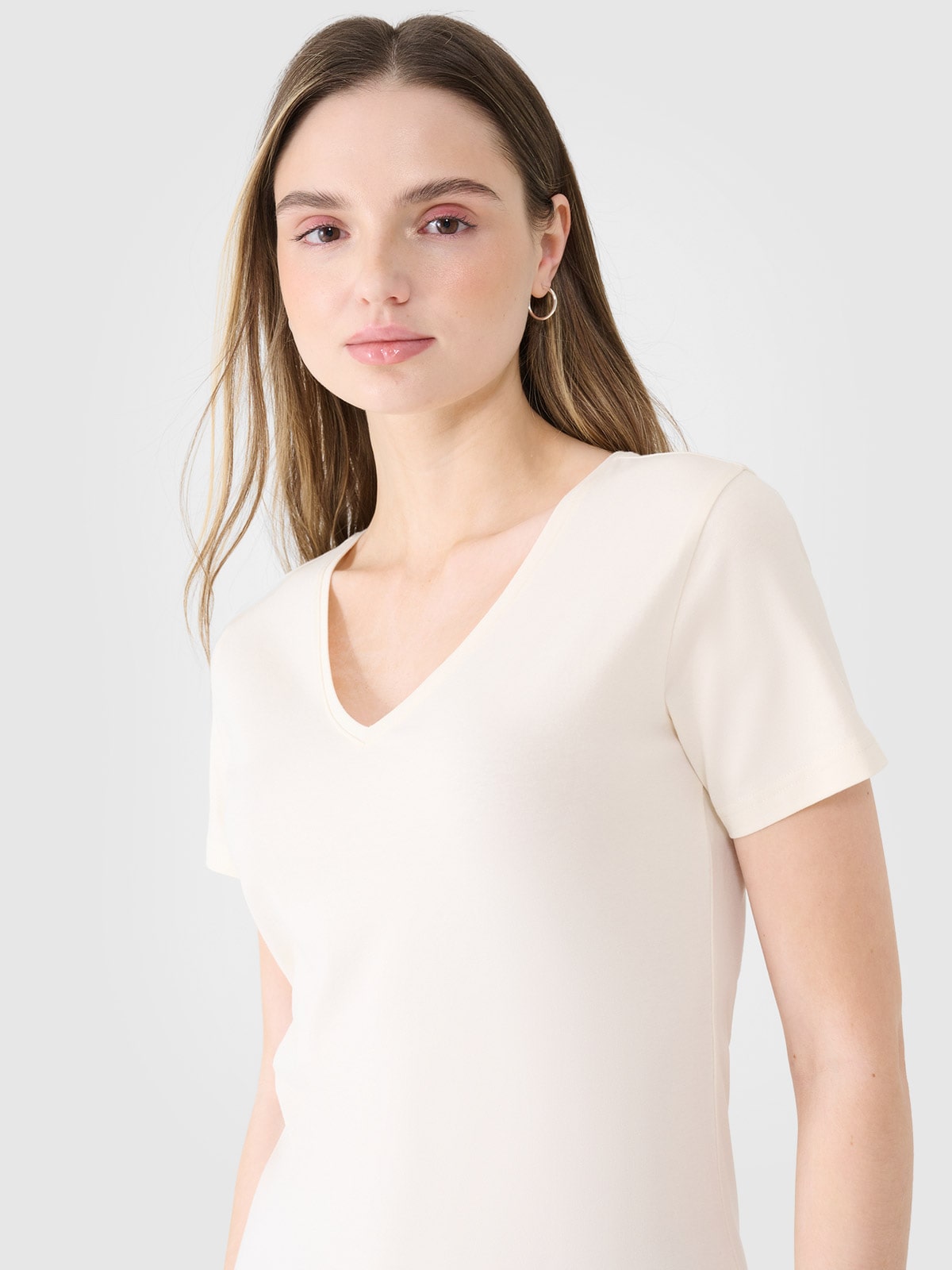 Жіноча однотонна футболка slim - білий