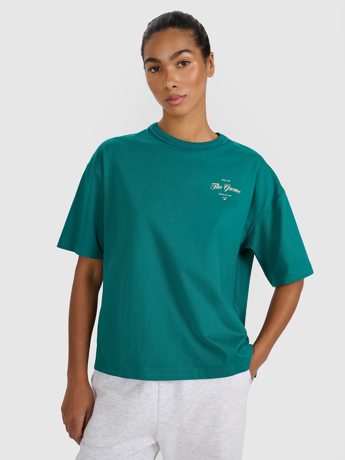 Жіноча oversize футболка з принтом - бірюзова