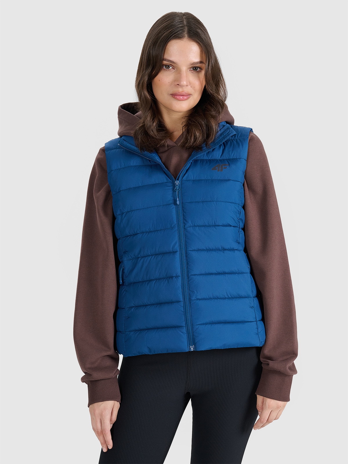 Жіночий пуховий жилет з синтетичним наповнювачем - темно-синій