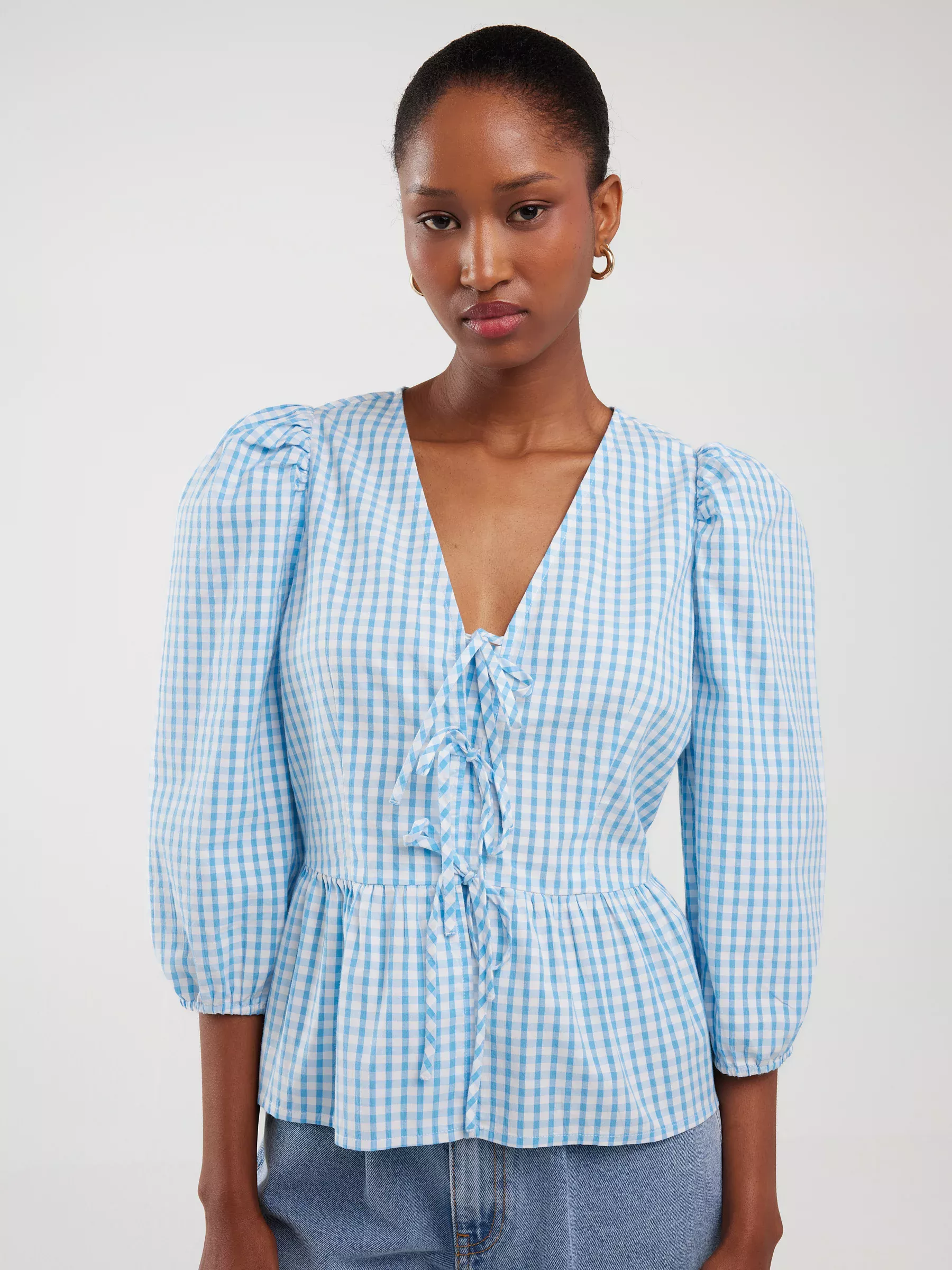 Bluzka damska z baskinką w drobną kratkę niebieska Sori 401