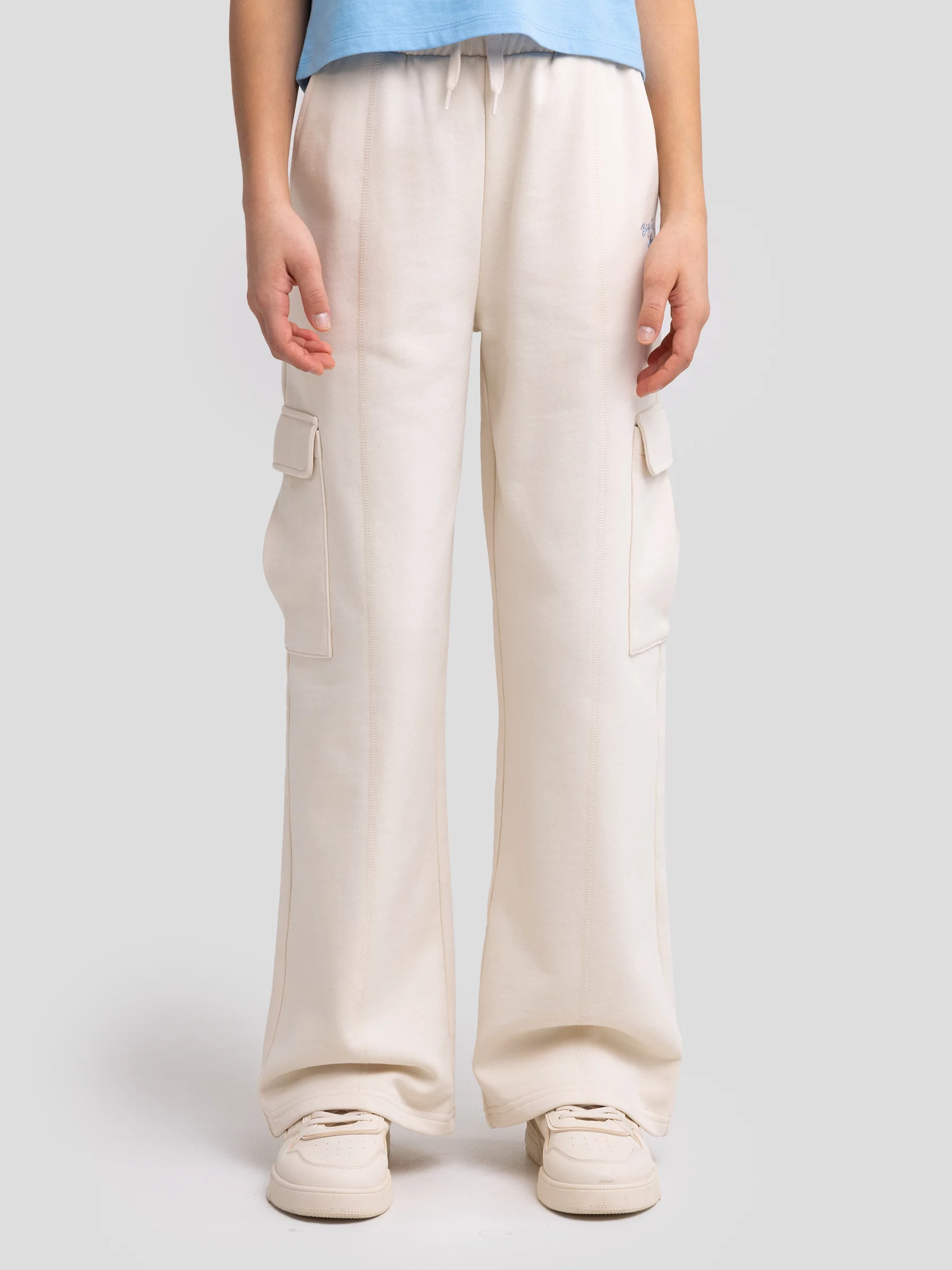 Spodnie dziewczęce dresowe cargo kremowe Naomap 103