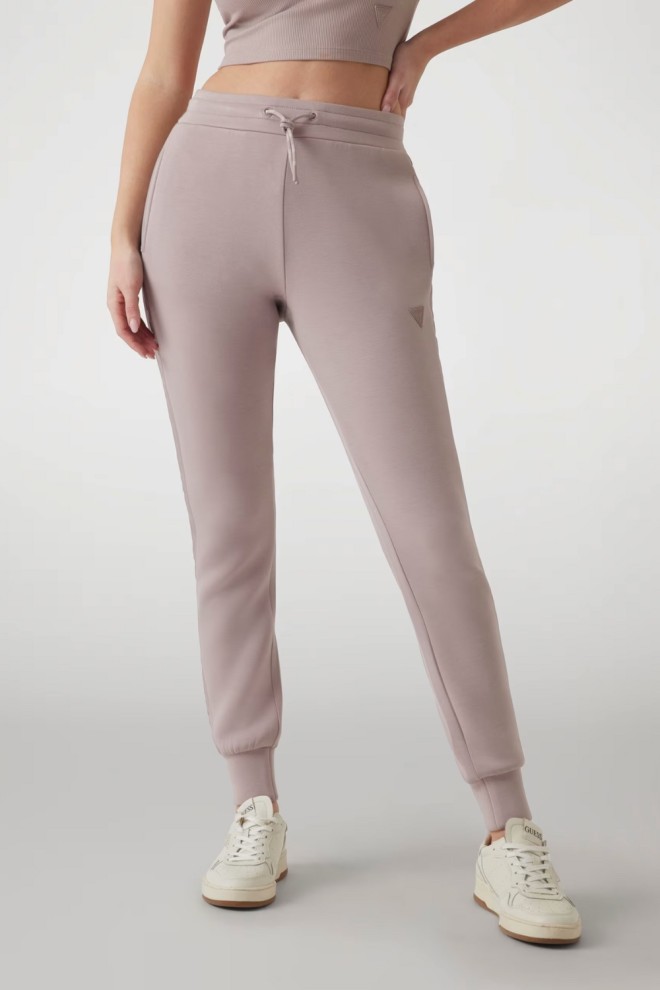 GUESS Dresowe damskie spodnie w kolorze taupe Allie Scuba, Rozmiar M