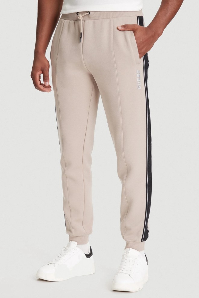 GUESS Beżowe spodnie męskie z lampasami Mickey, Rozmiar M