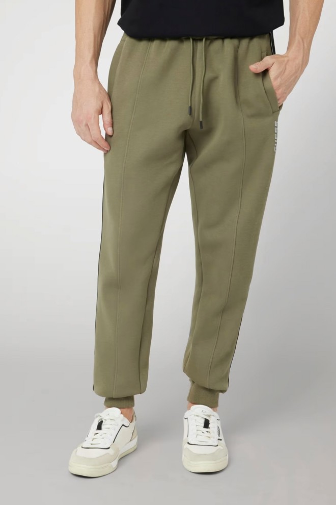 GUESS Zielone męskie spodnie dresowe z lampasami Mickey, Rozmiar XL