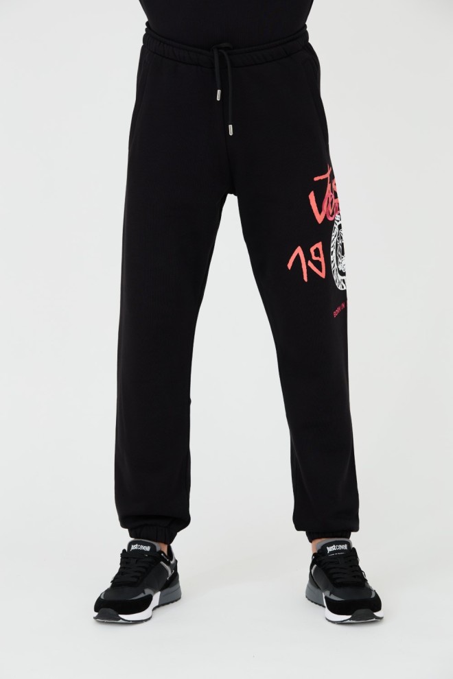 JUST CAVALLI Czarne męskie spodnie z nadrukiem R 1998 Dripp, Rozmiar XL