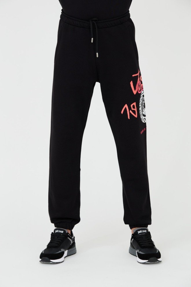 JUST CAVALLI Czarne męskie spodnie z nadrukiem R 1998 Dripp, Rozmiar XL