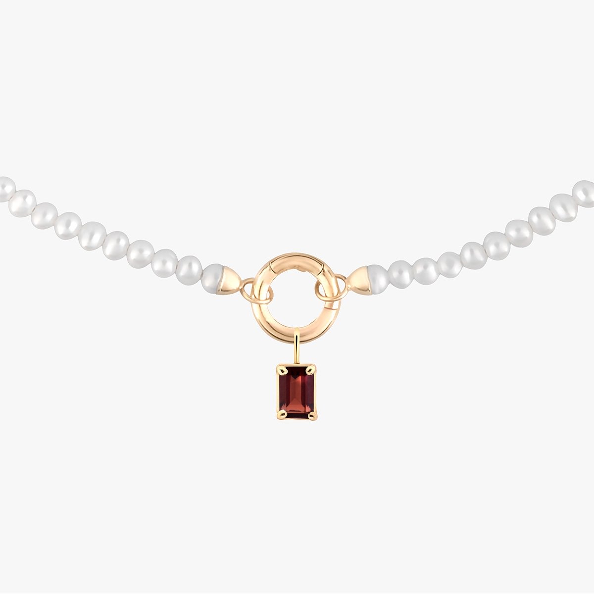 W.KRUK Wisiorek złoty z granatem