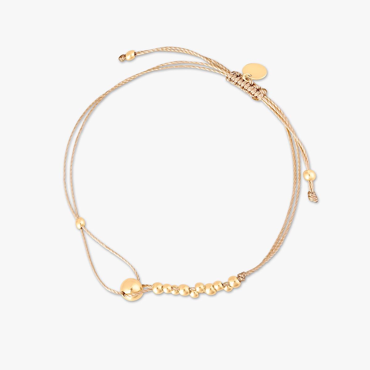 W.KRUK Bransoletka na beżowym sznurku