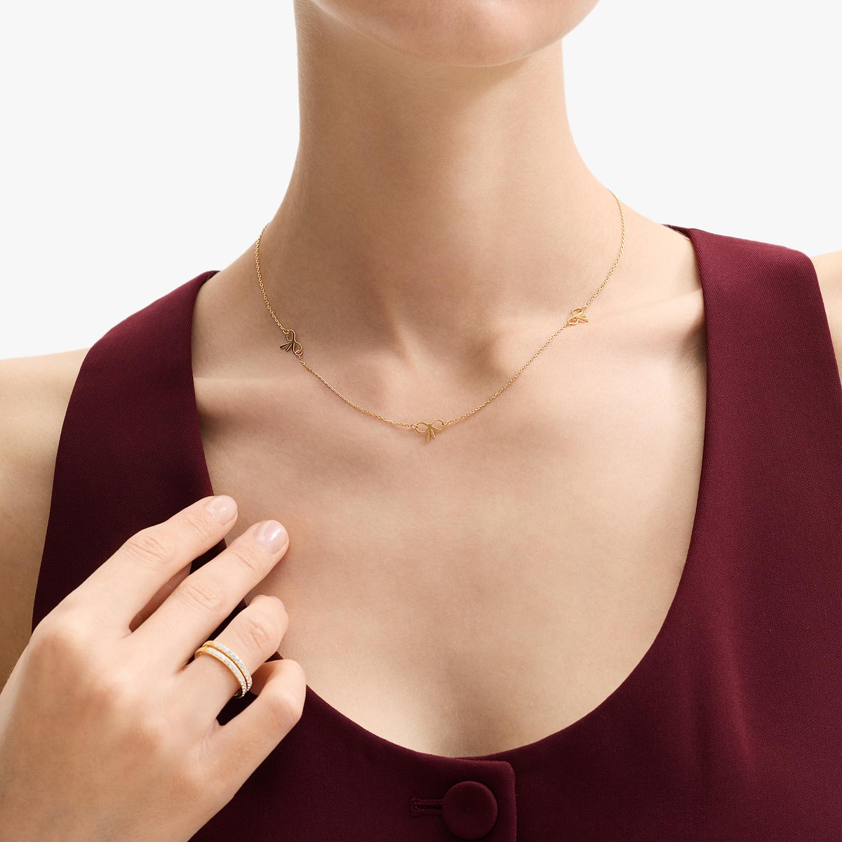 W.KRUK Naszyjnik srebrny z kokardkami