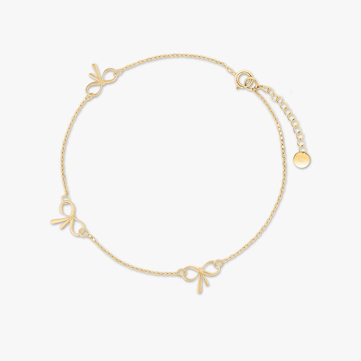 W.KRUK Bransoletka srebrna z kokardkami