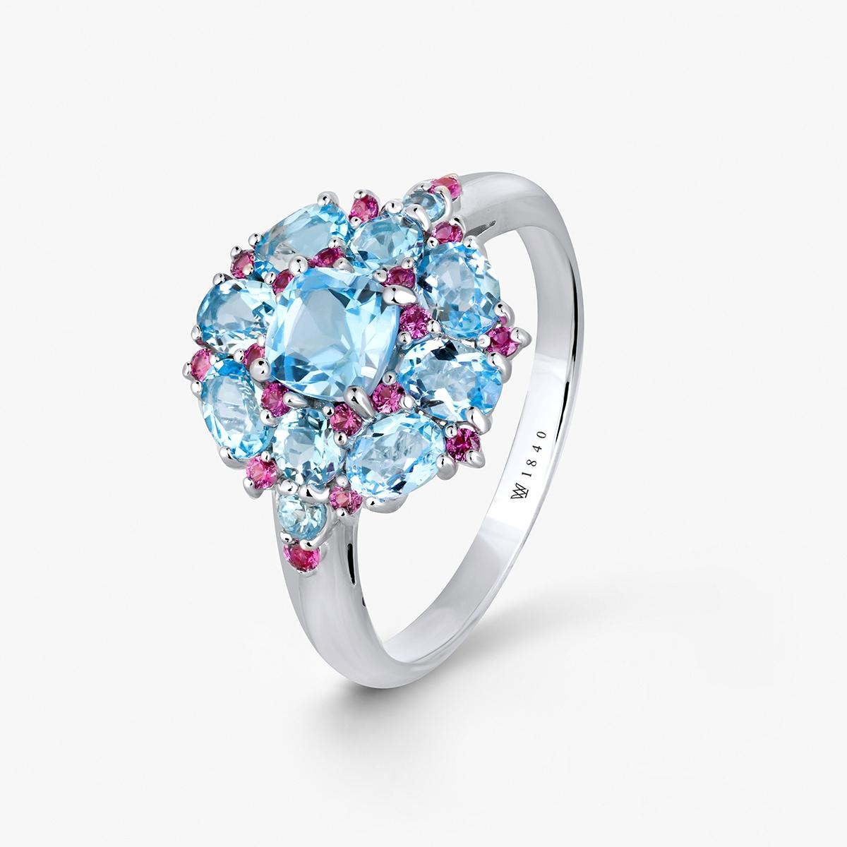 W.KRUK Pierścionek srebrny z topazami