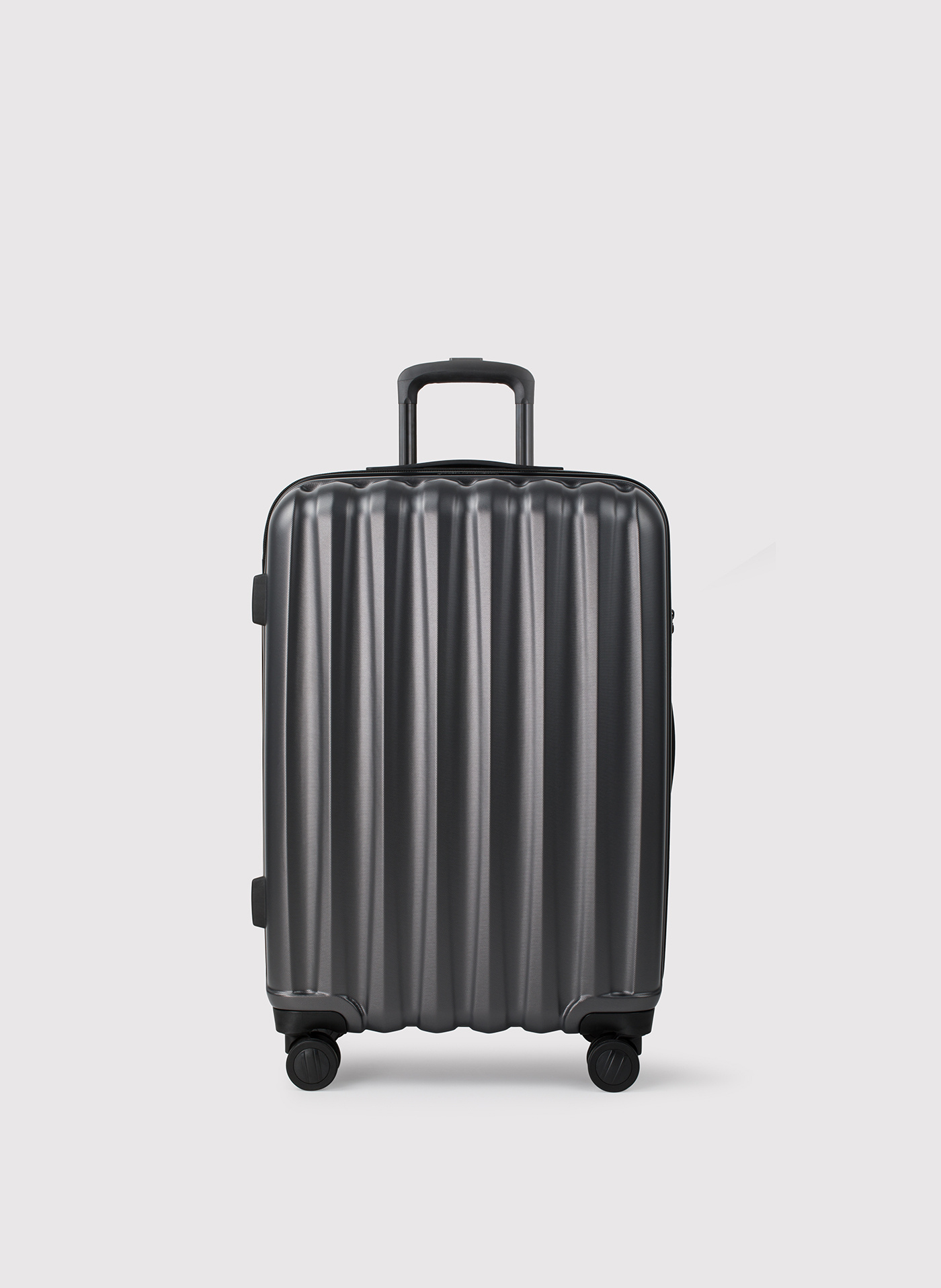 PAKO LORENTE – Średnia ciemnoszara walizka ze żłobieniami