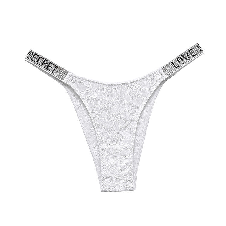 Stringi z szerokim paskiem i ozdobnymi detalami Rakita