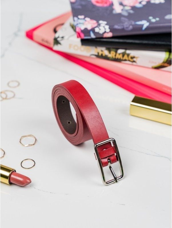 Wąski pasek damski z klasyczną, metalową sprzączką w srebrnym kolorze Nie dotyczy