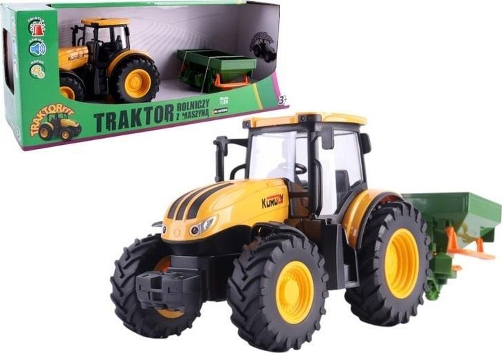 Traktor rolniczy z rozsiewaczem