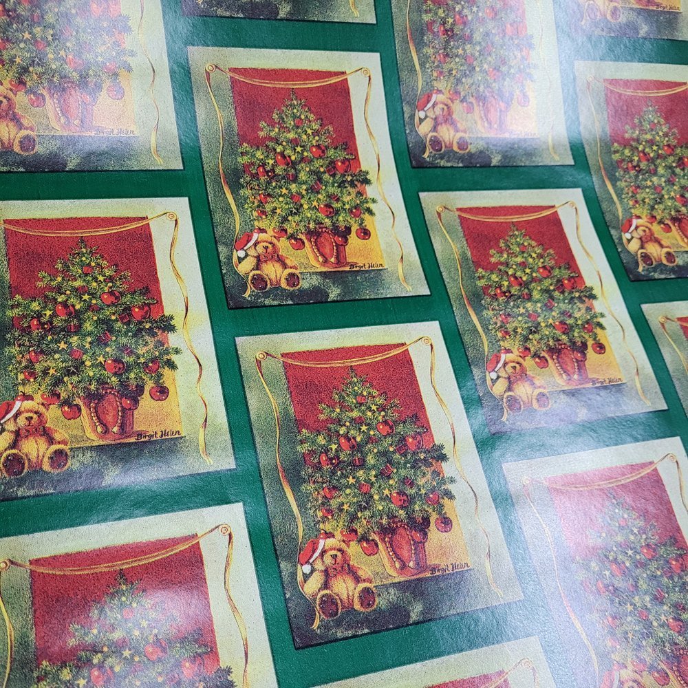 Papier zielony mikołaj do pakowania 57cmx2m 2m310