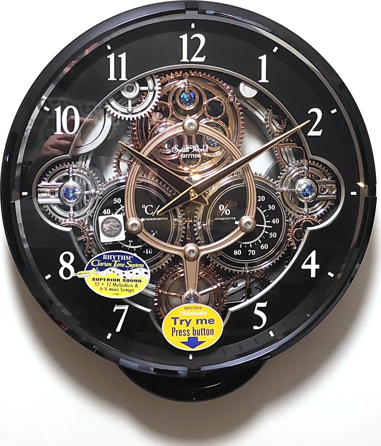 RHYTHM Zegar ścienny 4MH886WD02 melodie Magic Motion