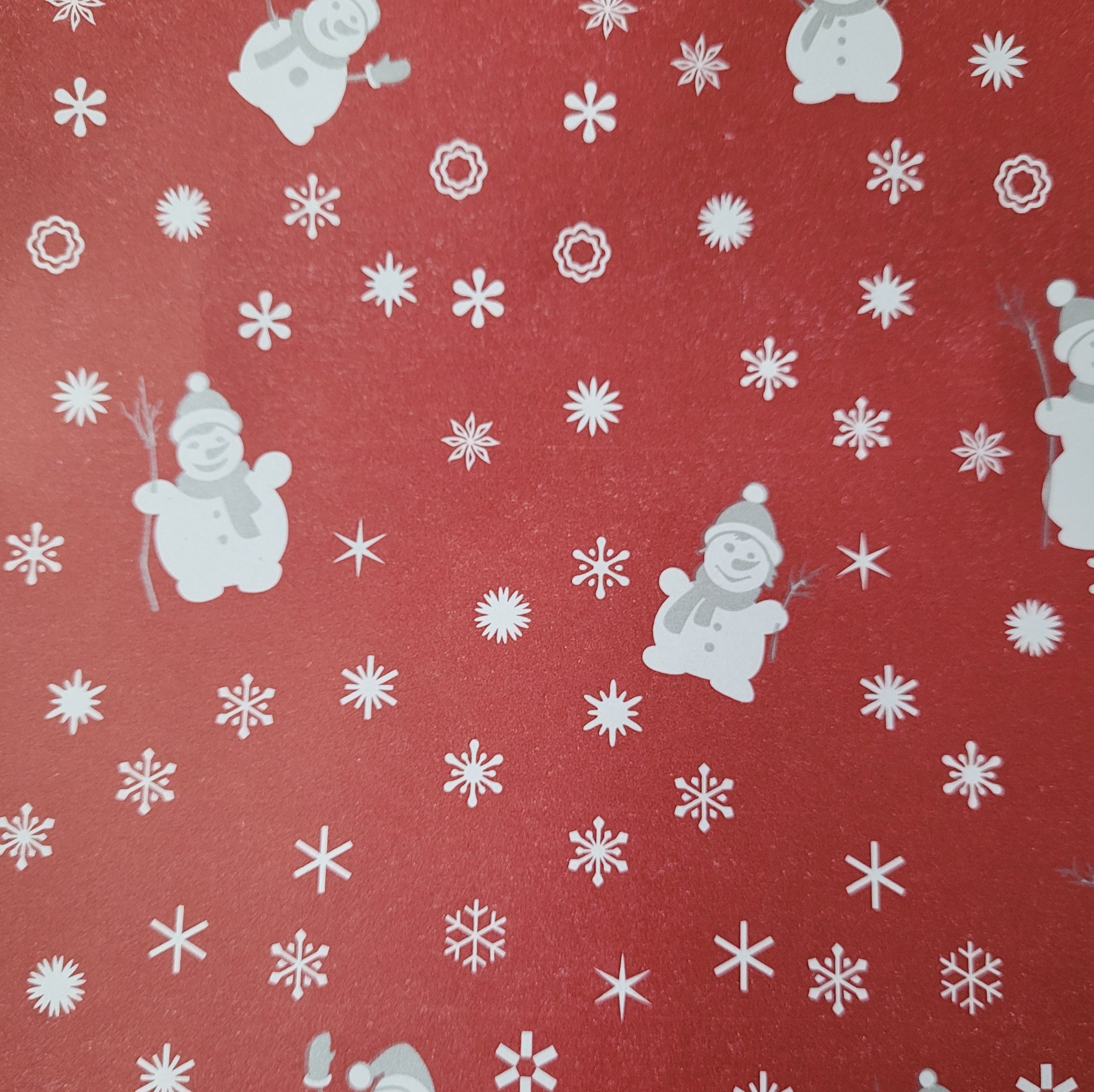 Papier świąteczny do pakowania 57cmx2m 2m744 czerwony bałwan