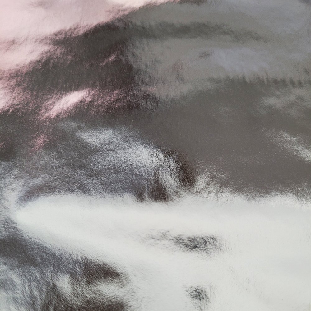 Papier srebrny do pakowania 57cmx2m 2m348