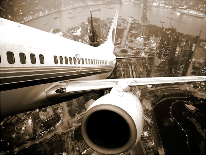 DecoNest Fototapeta - Samolot wzbijający się w powietrze - 300X231