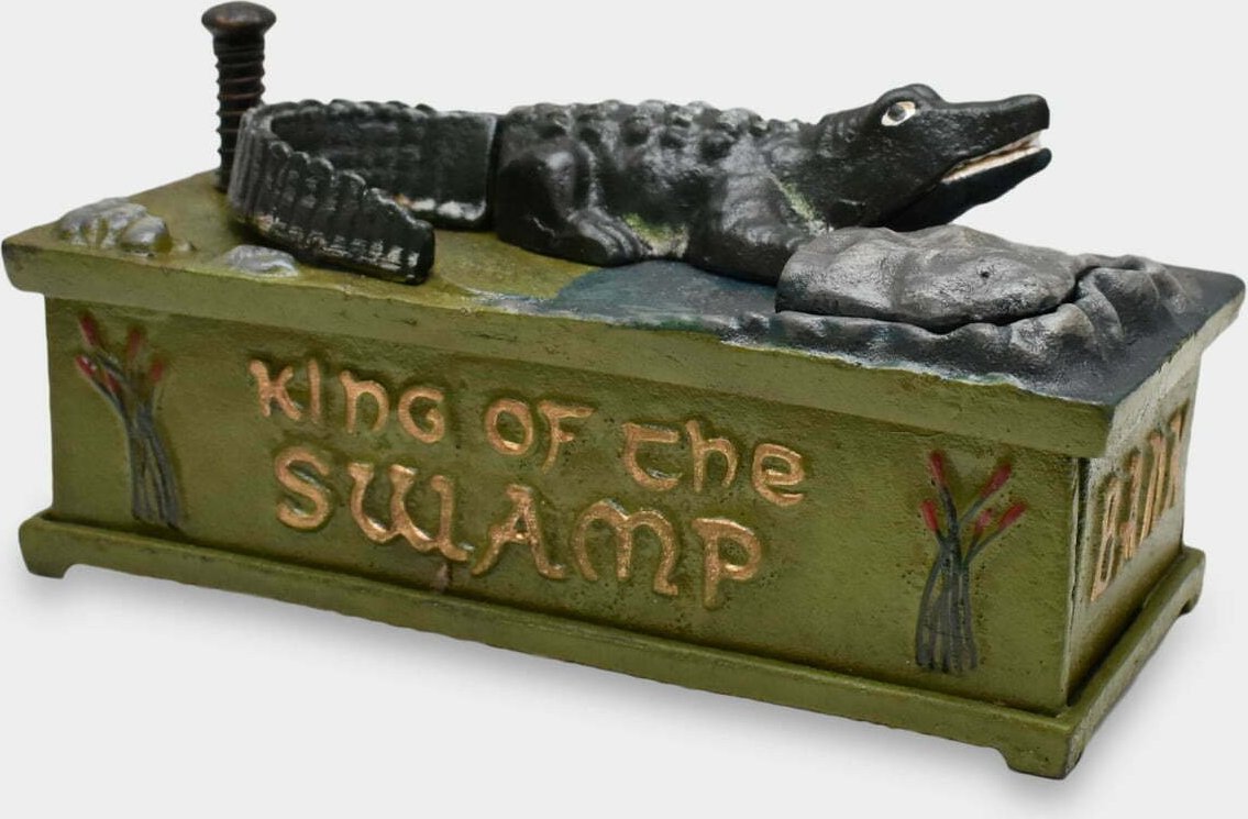 rzezbyzbrazu Żeliwna Skarbonka Mechaniczna Aligator w Bagnie