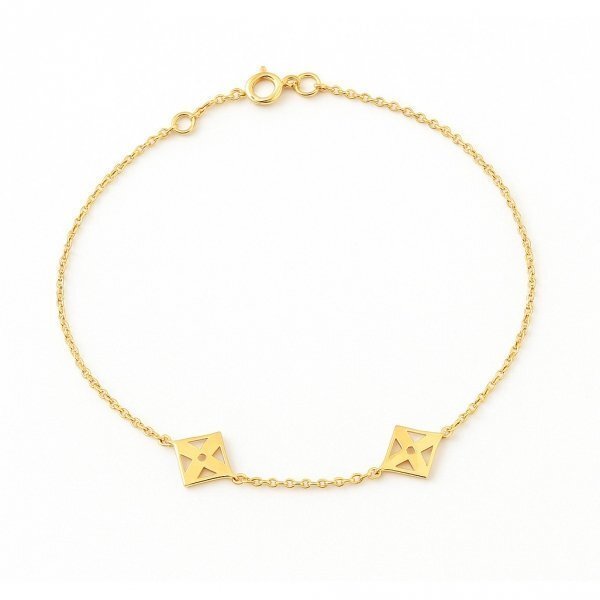 Złota bransoletka ażurowa 585 z delikatnymi kwadratami