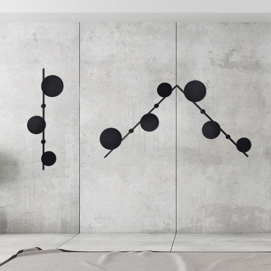 Kinkiet Kaja Czarny kinkiet Rega designerska lampa ścienna na przedpokój