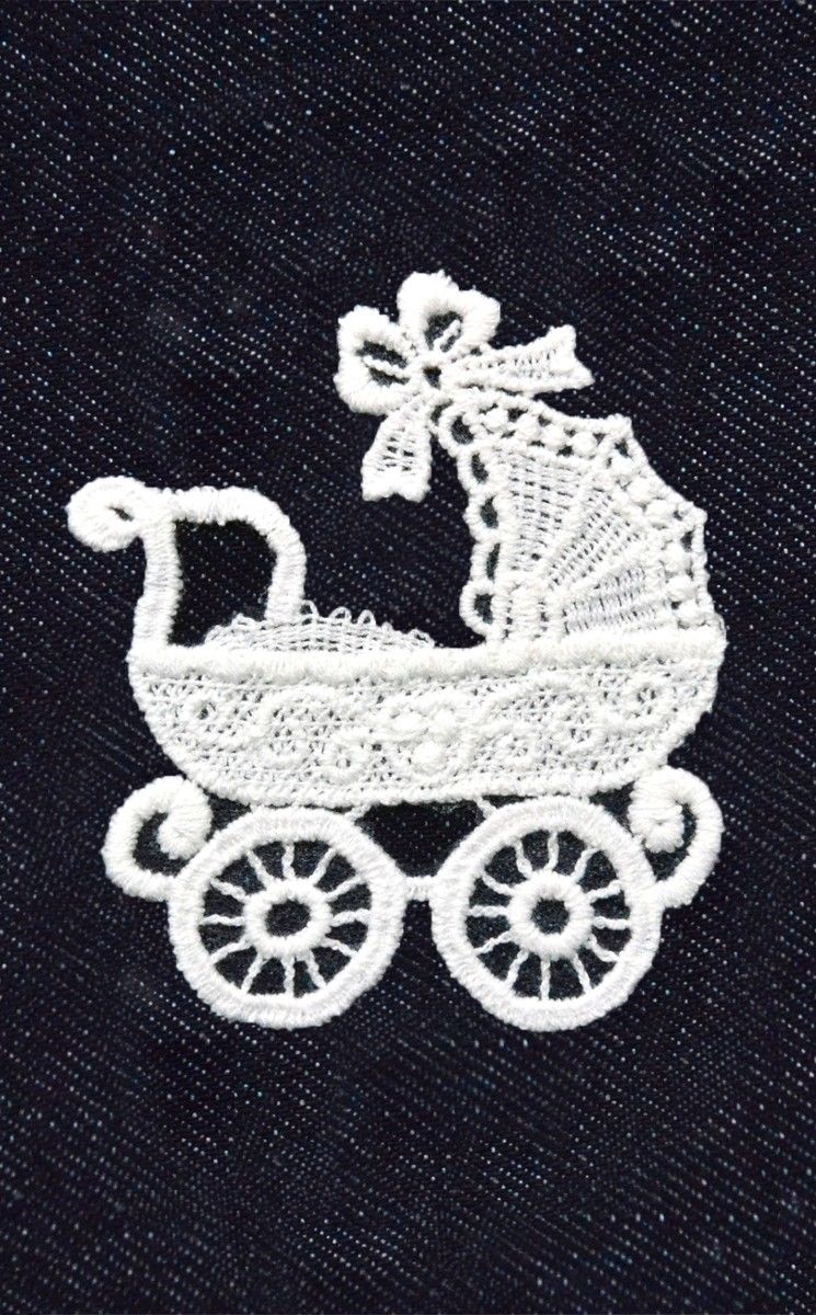 Ki-Sign Naprasow. Koronkowa Wózeczek