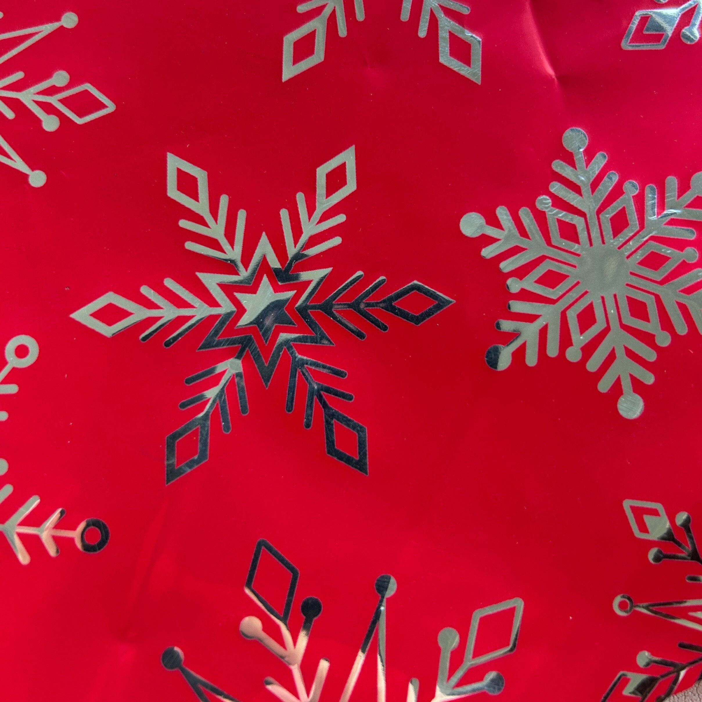 Folia świąteczna do pakowania czerwony gwiazdy 70cmx2m 309m70