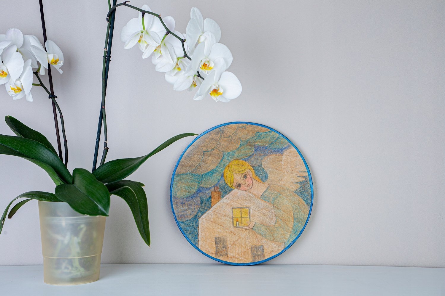 Obraz na płycie - Anioł chroniący dom przed burzą