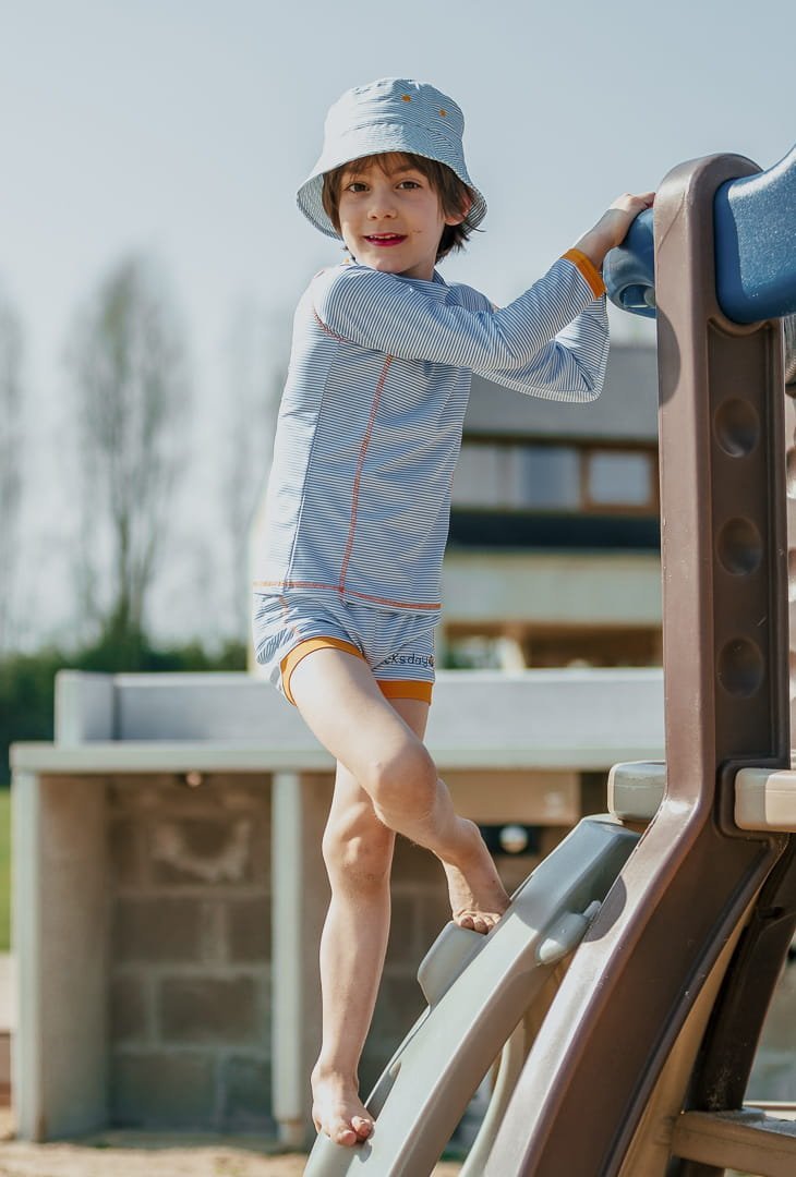 DucKsday Koszulka plażowo-kąpielowa dziecięca uniseks, filtr UV 50+, True Blue, rozmiar 4 lata (98-104)