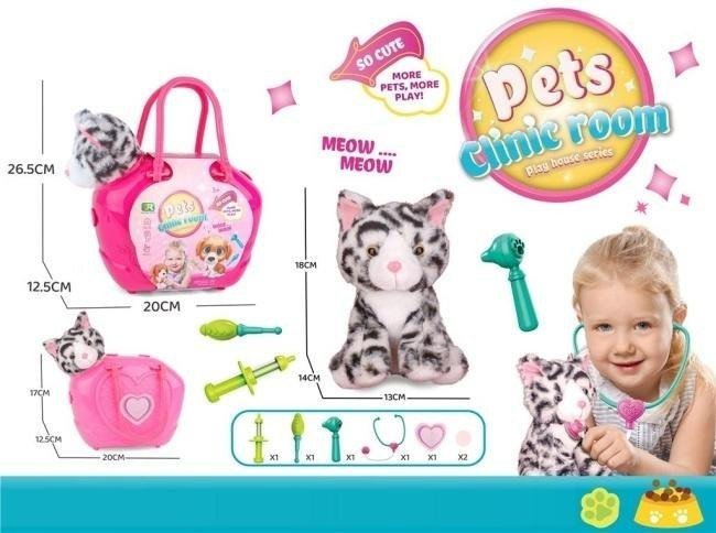 Kotek w torbie z akcesoriami