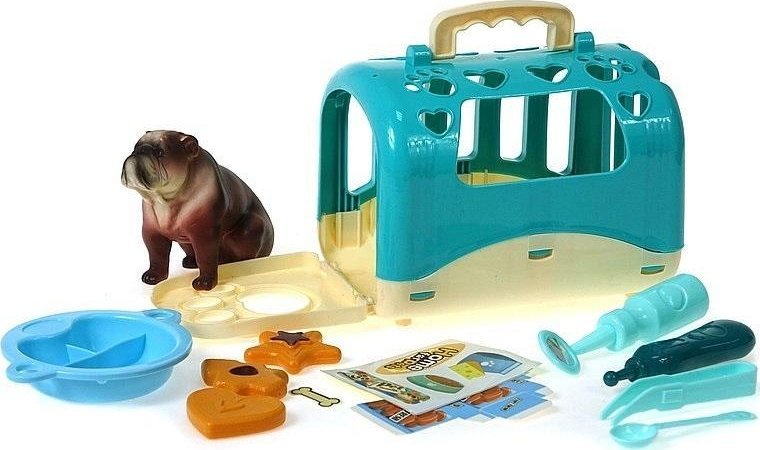 Piesek z klatką do przenoszenia z akcesoriami