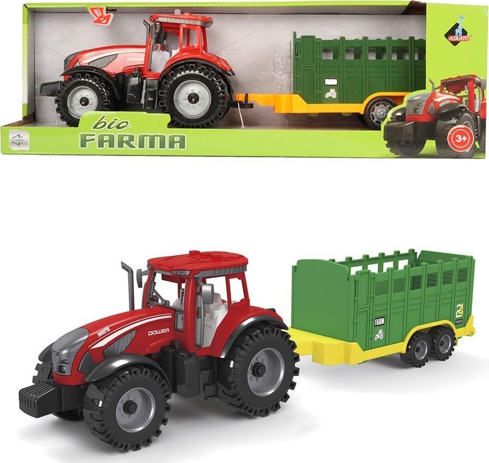 Traktor z zieloną przyczepą