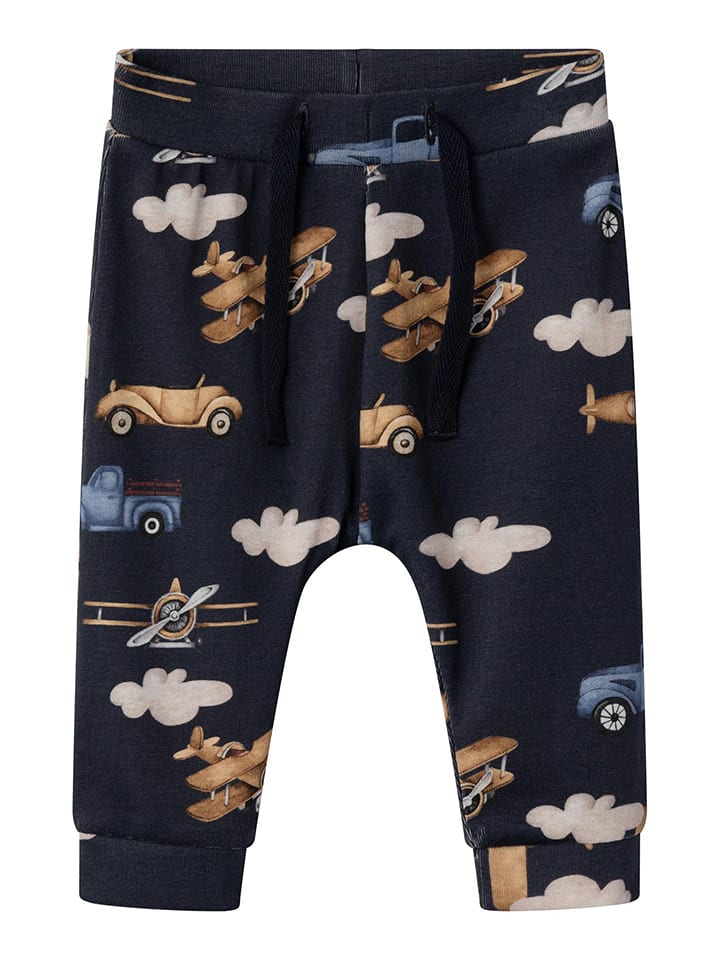 name it Spodnie dresowe "Roccar" w kolorze granatowym ze wzorem rozmiar: 80