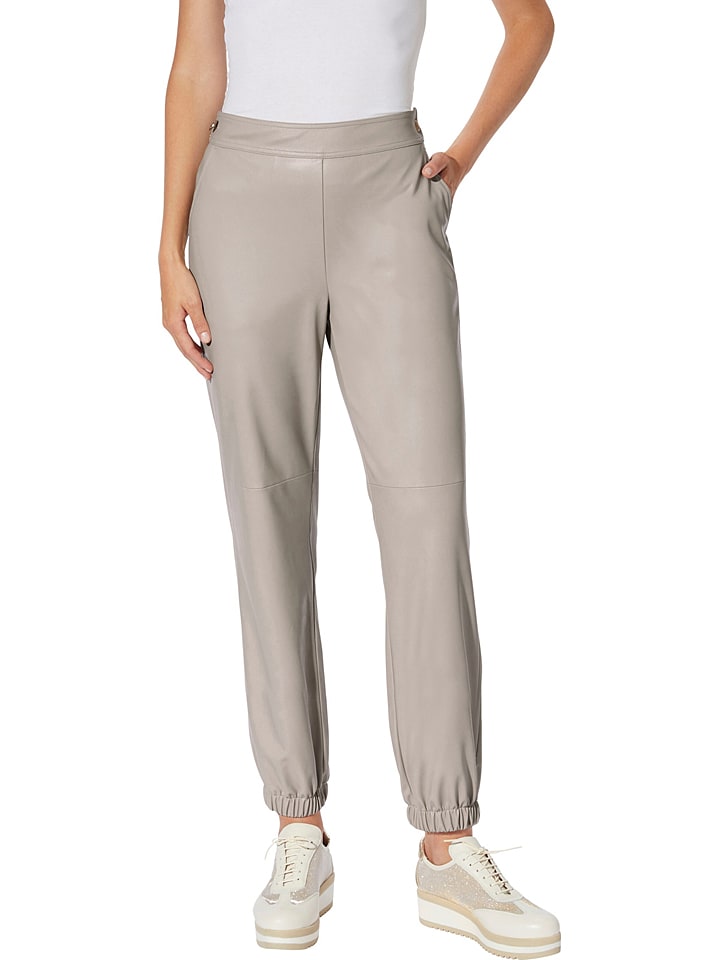 Heine Spodnie w kolorze beżowym ze skóry syntetycznej rozmiar: 44