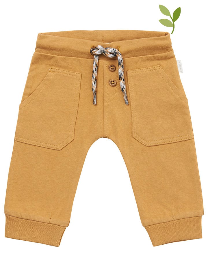 Noppies Spodnie dresowe "Murphy" w kolorze pomarańczowym rozmiar: 62