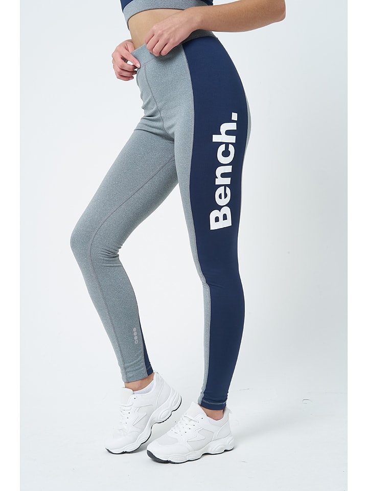 Legginsy sportowe "Tavia" w kolorze granatowo-szarym