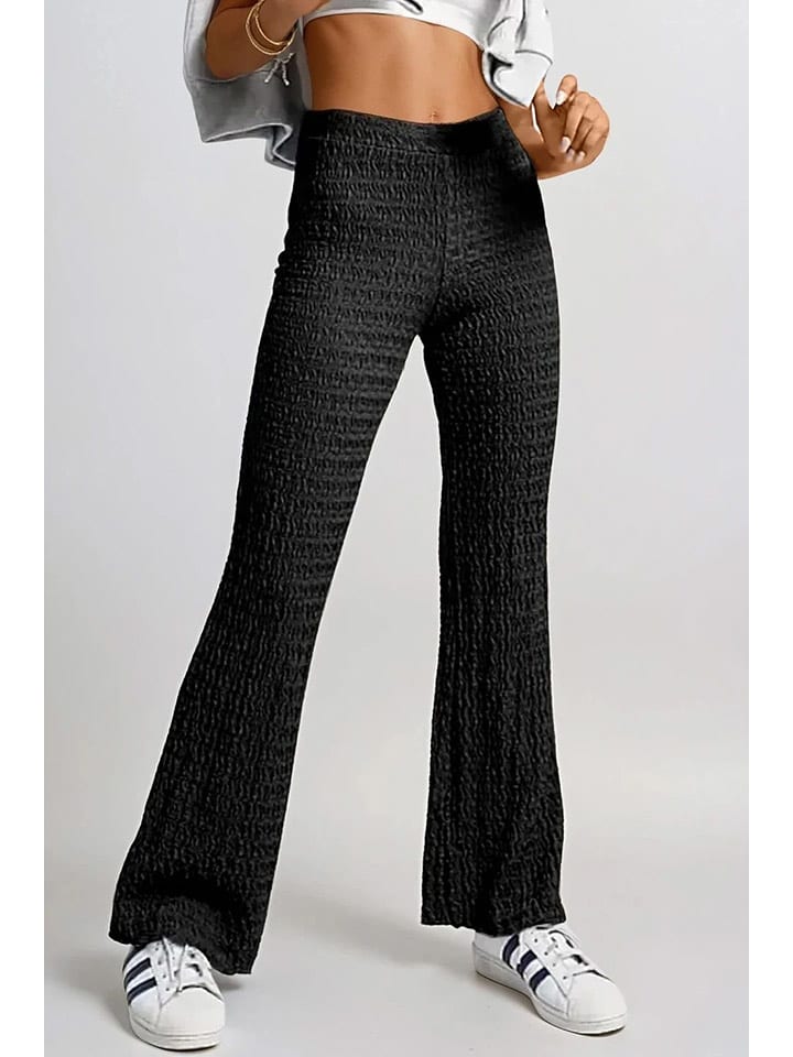 Monki Spodnie w kolorze czarnym rozmiar: L