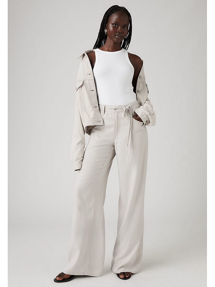 Levi's Spodnie - Comfort fit - w kolorze kremowym rozmiar: W28/L33