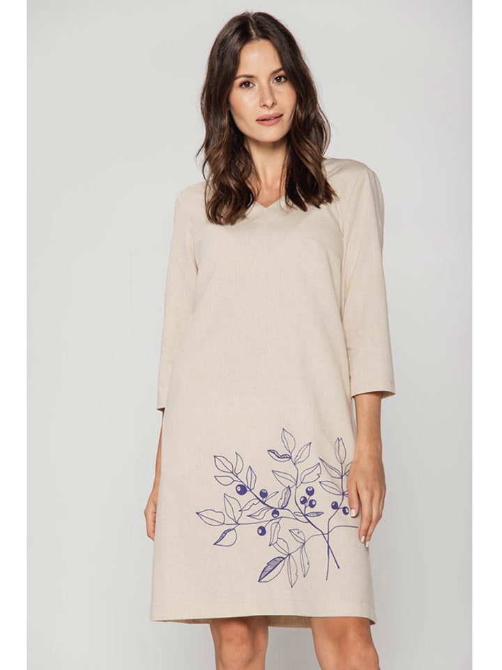 Sukienka w kolorze beżowym ze wzorem