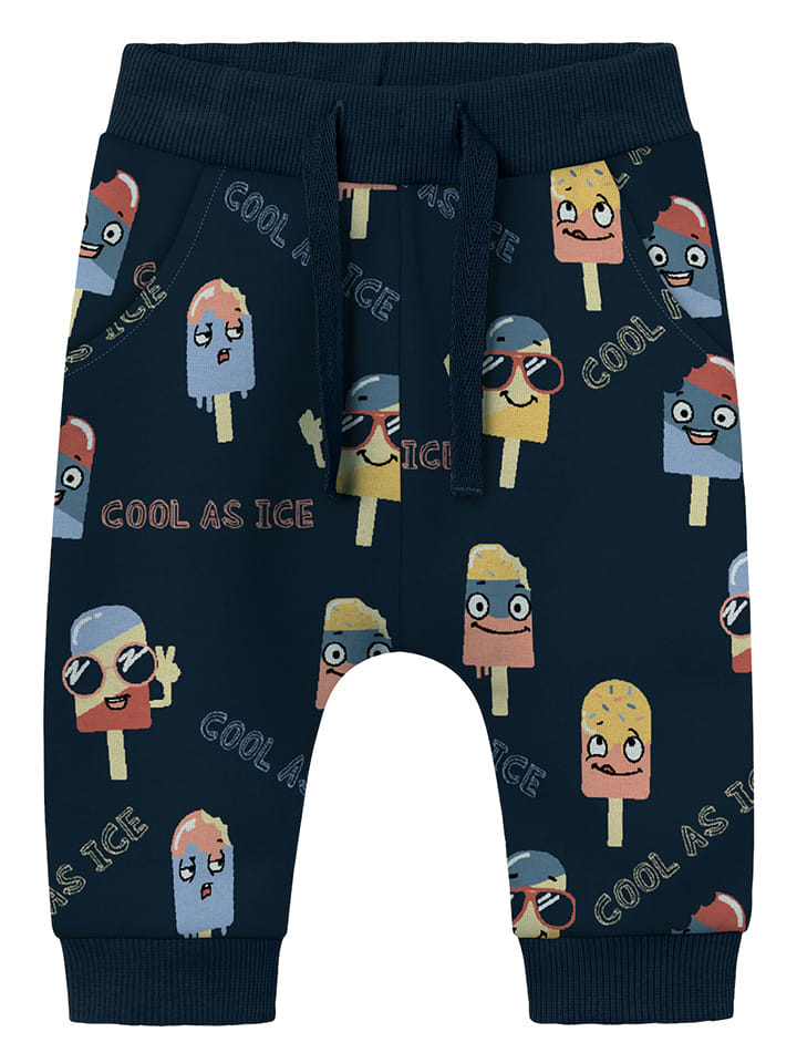 name it Spodnie dresowe "Himmel" w kolorze granatowym ze wzorem rozmiar: 80